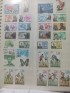 Miniatura - Coleção com 506 selos em classificador (Mongólia, Togalaise e Rwandaise)