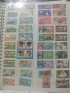Miniatura - Coleção com 506 selos em classificador (Mongólia, Togalaise e Rwandaise)