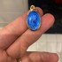 Miniatura - Medalha Oval: Nossa Senhora de Lourdes com Água da gruta de Lourdes (Dourada)
