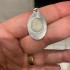 Miniatura - Medalha Oval: Nossa Senhora de Lourdes com Água da gruta de Lourdes (Prateada)