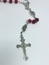 Miniatura - Terço vermelho de Medjugorje – Perfumado + Lencinho encostado na Estátua do Cristo Ressuscitado